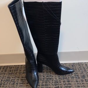 Faux leather knee boots. NEVER WORN!
